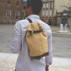 sac à dos à bandoulière en toile cirée et cuir