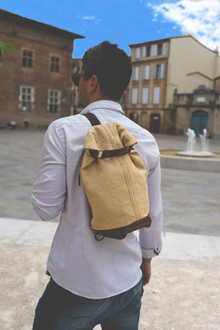 sac à dos à bandoulière en toile cirée et cuir